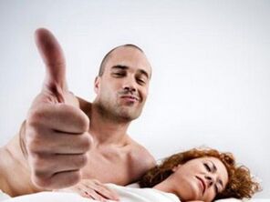 Woman and a man using folk remedies to enlarge his penis